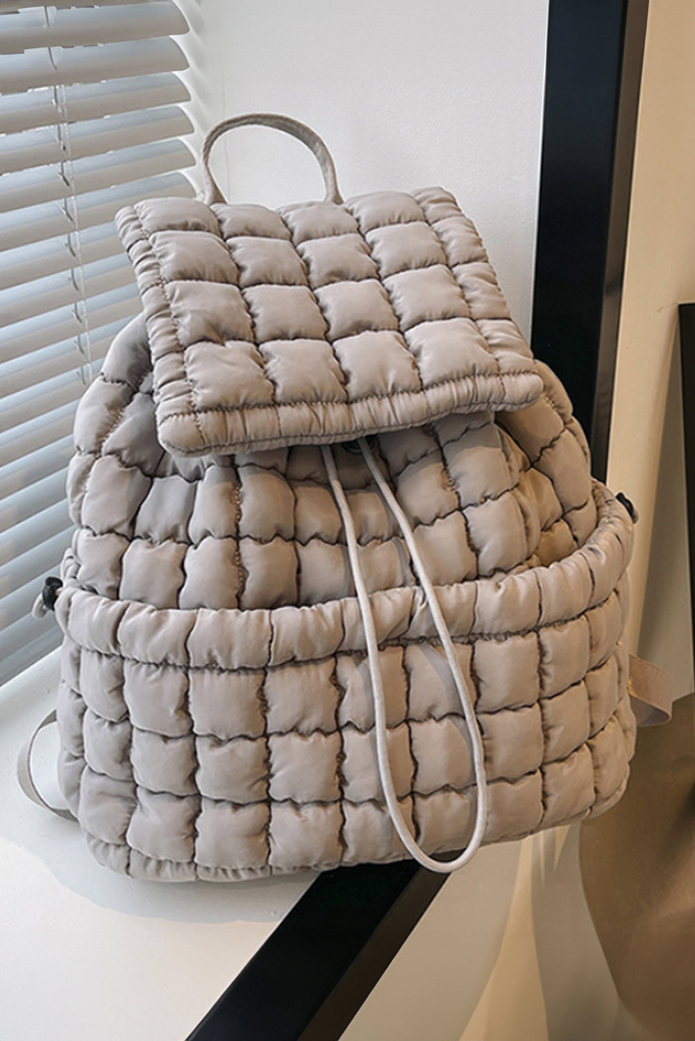 Solid Flapped Quilted Puffer Backpack