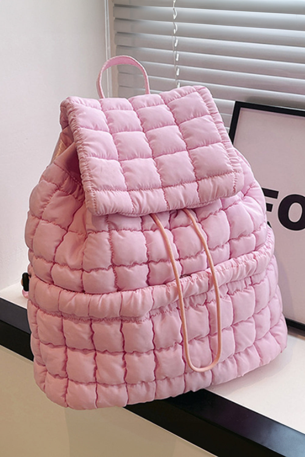 Solid Flapped Quilted Puffer Backpack