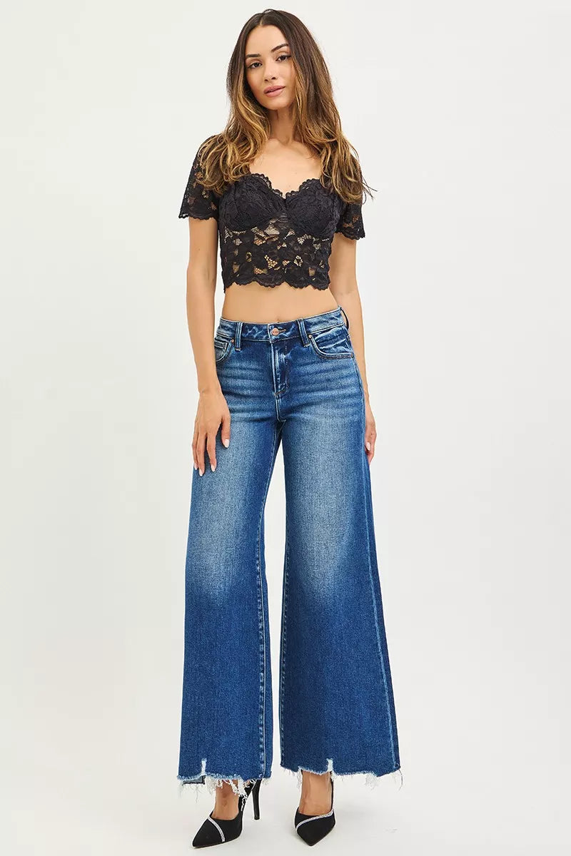 RISEN High Rise Wide Leg Jeans with Distressed Hem.