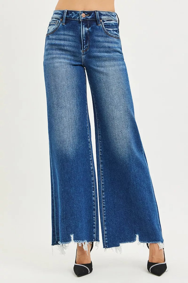 RISEN High Rise Wide Leg Jeans with Distressed Hem.