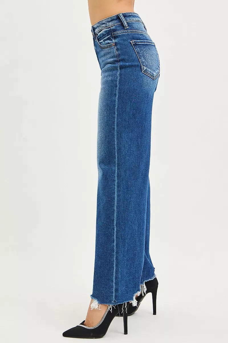 RISEN High Rise Wide Leg Jeans with Distressed Hem.