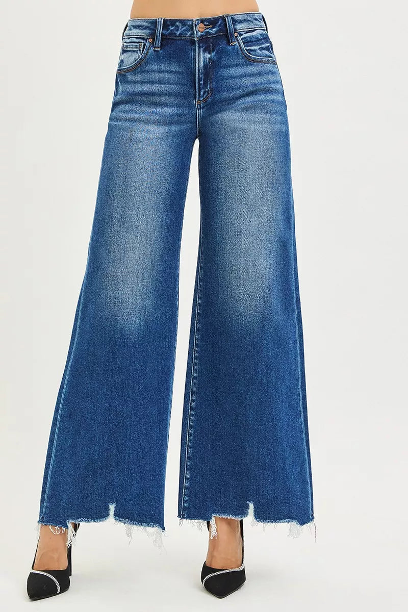 RISEN High Rise Wide Leg Jeans with Distressed Hem.