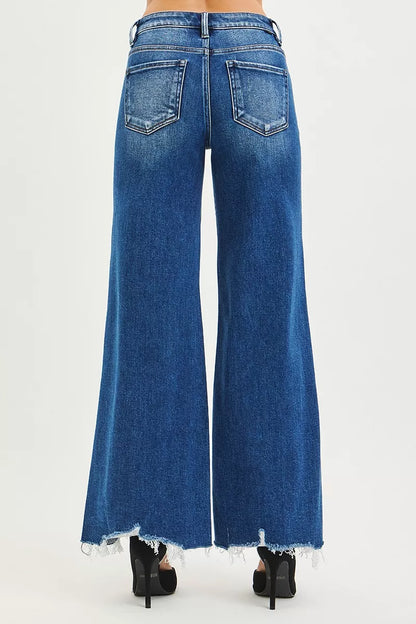 RISEN High Rise Wide Leg Jeans with Distressed Hem.