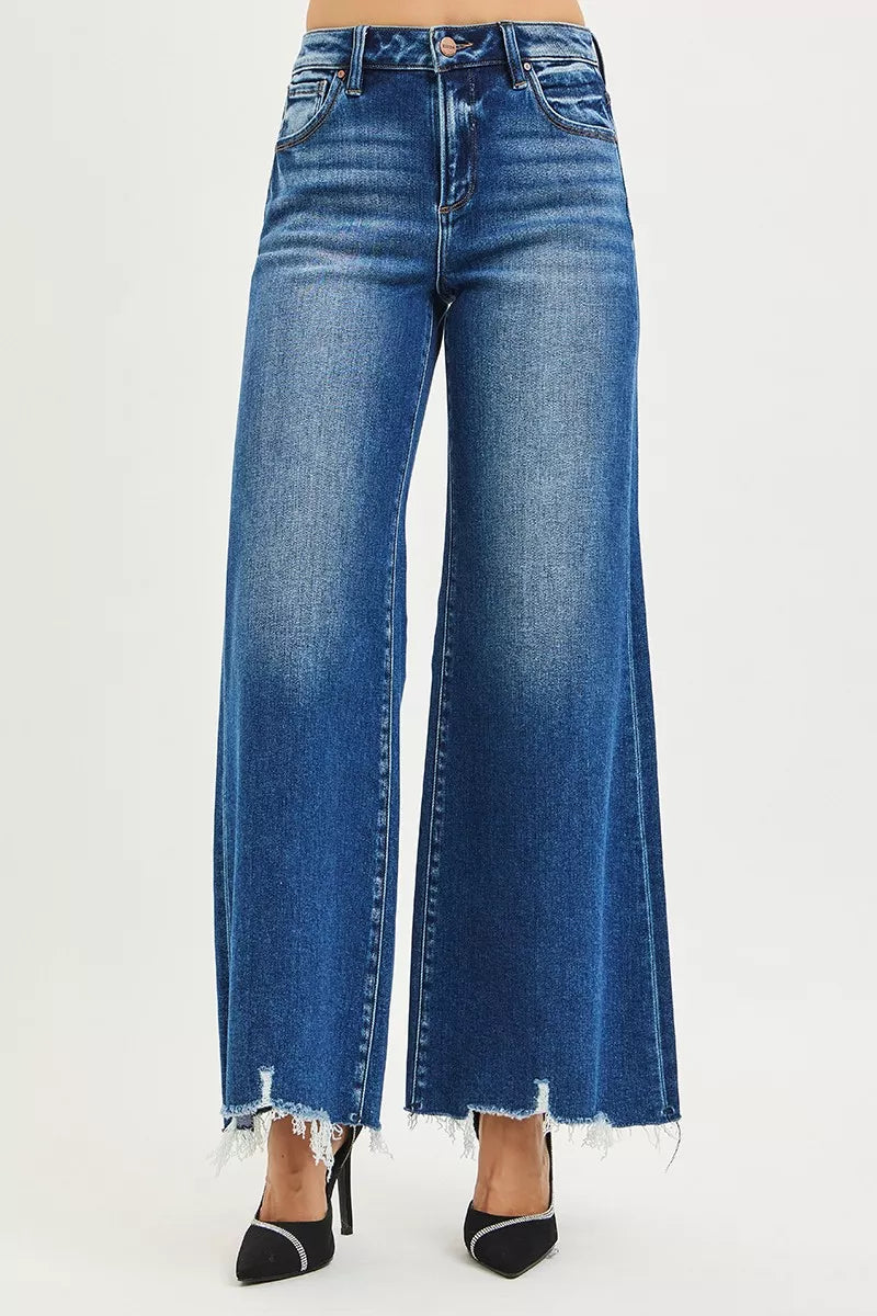 RISEN High Rise Wide Leg Jeans with Distressed Hem.